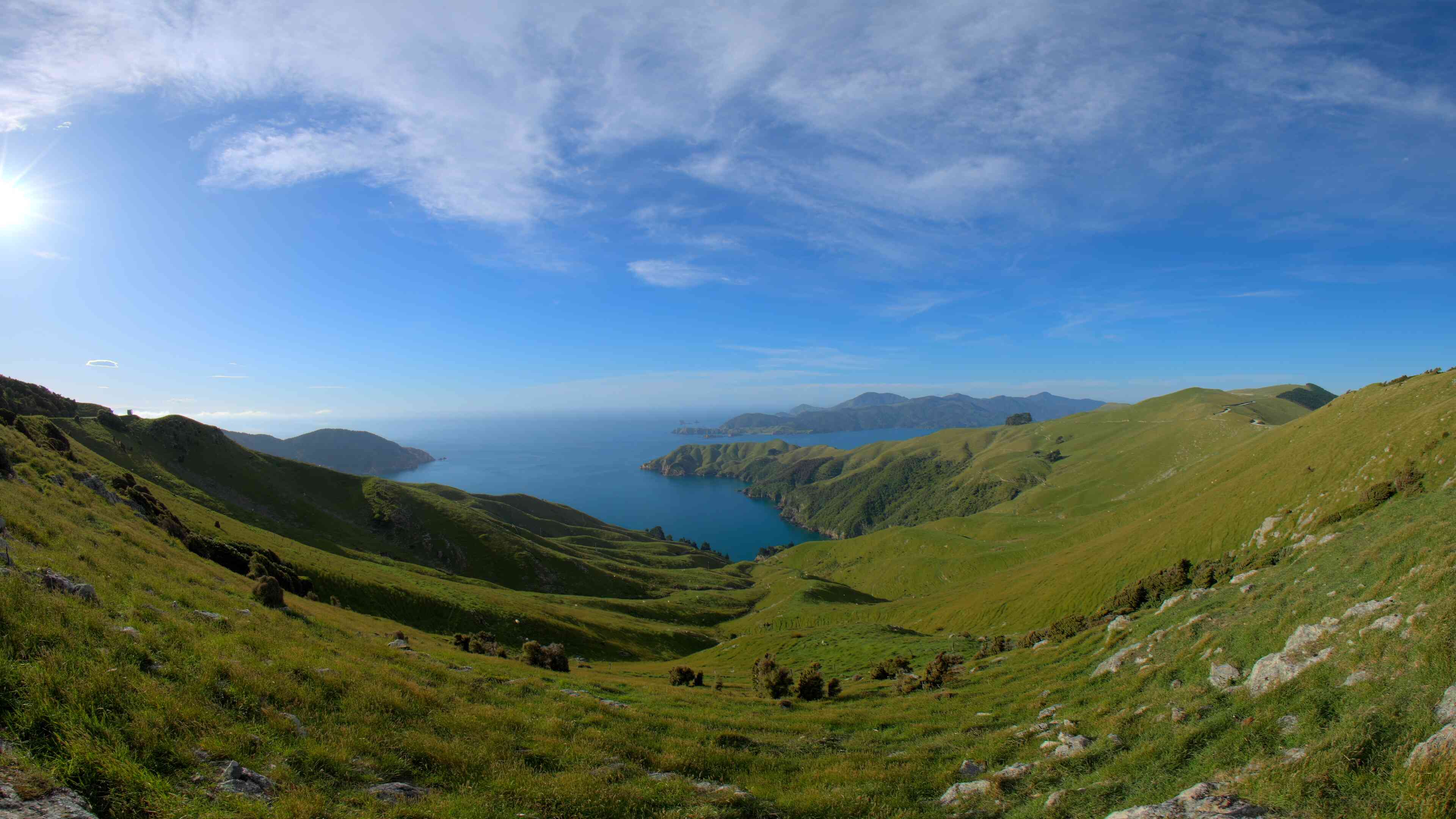 Rolling Green Hills and Coastal Views